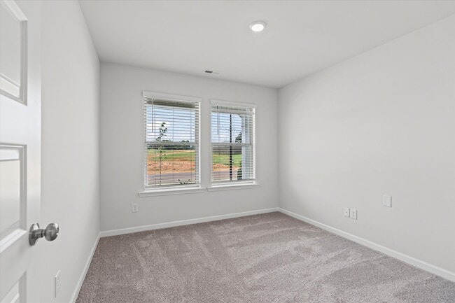 Building Photo - New 3BR Home in Whispering Woods – Modern ...