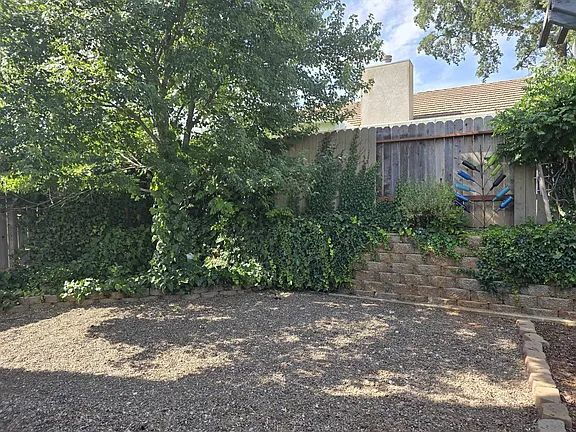 Building Photo - Freshly painted home with newer appliances. Quiet neighborhood near parks, shopping and schools.