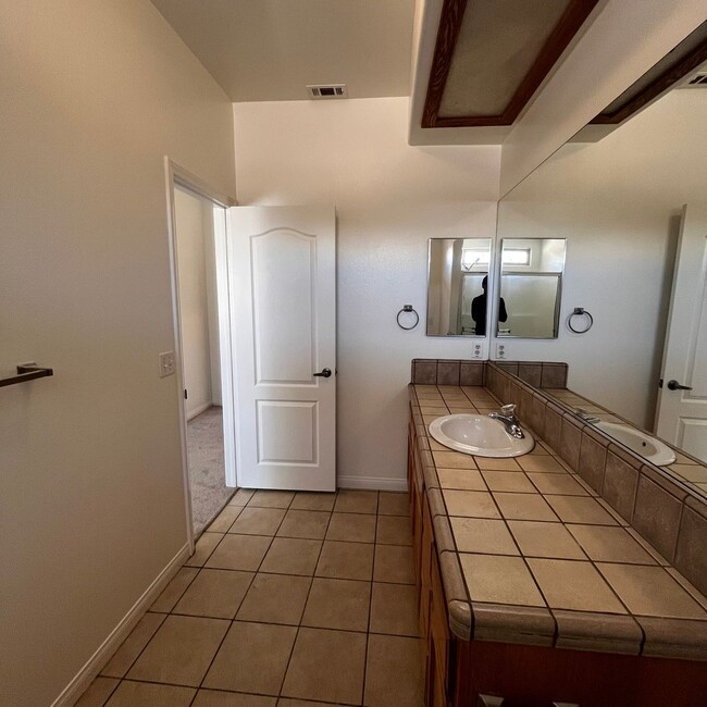 Building Photo - 7764 Corona Ave