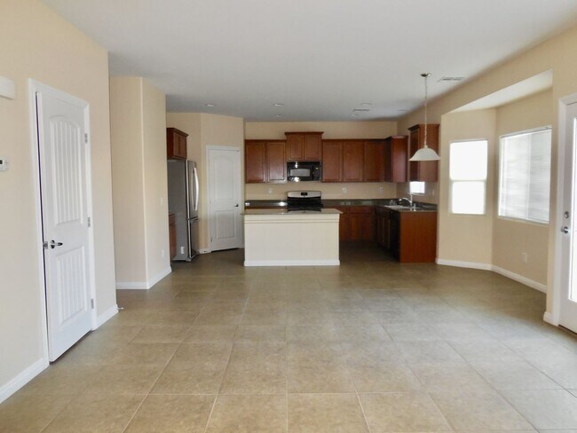 Building Photo - Spacious House w/Tons of Storage,Tile & Wo...