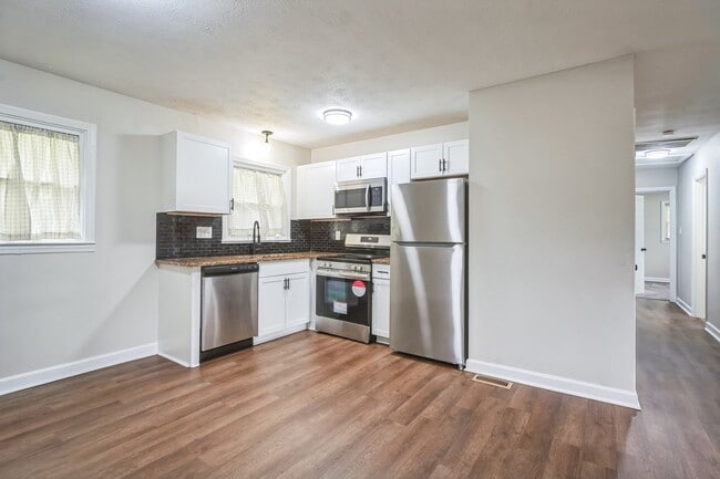 Building Photo - 4BR Brick Ranch with Upgrades & Room to Feel at Home!