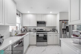 Building Photo - 6650 Royal Palm Blvd