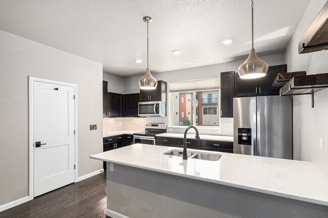Building Photo - Creekside Townhome with Balconies on Every...