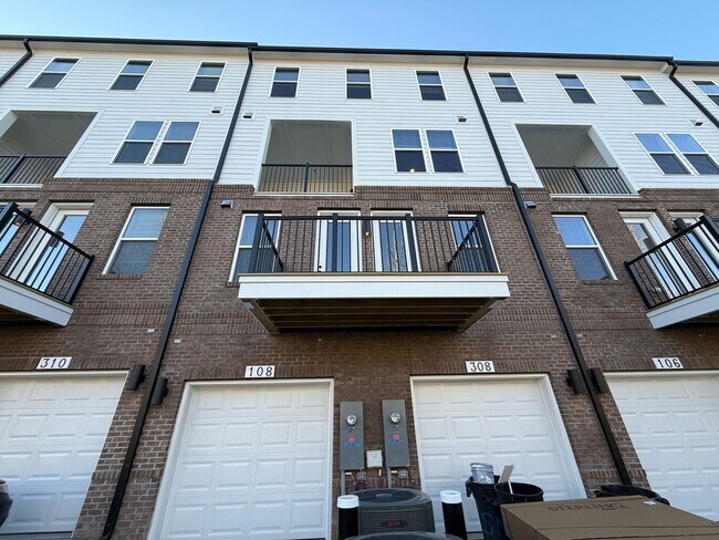 Building Photo - Stunning New Construction 2BD, 2.5BA Cary Townhome-Style Condo with a 1-Car Garage & Bonus Flex S...