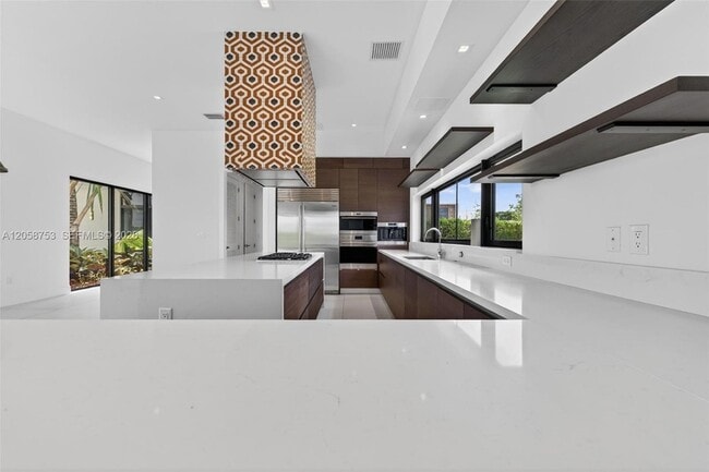 Building Photo - 16709 Botaniko Dr N
