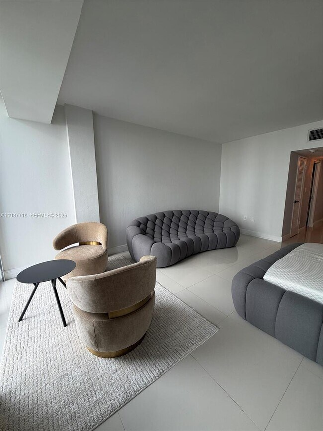 Building Photo - 10275 Collins Ave