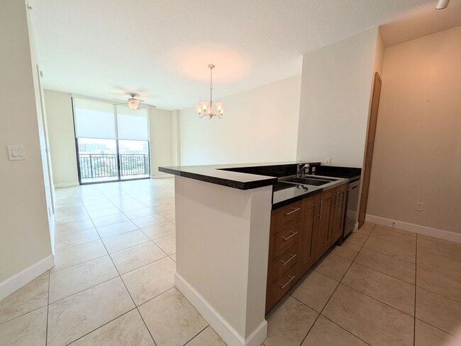 Building Photo - Modern 1BR/1BA Condo with 2 Parking Spaces – Prime Coral Gables Location