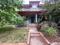 Building Photo - A home where old-world charm meets modern sophistication!