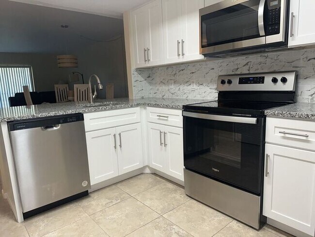 Building Photo - EASTLAKE WOODLANDS - GATED GOLF COMMUNITY