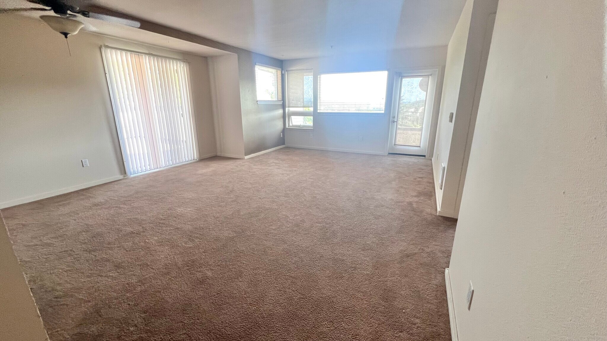 Living Room (additional small patio at back of unit) - 15340 Macadam Rd S