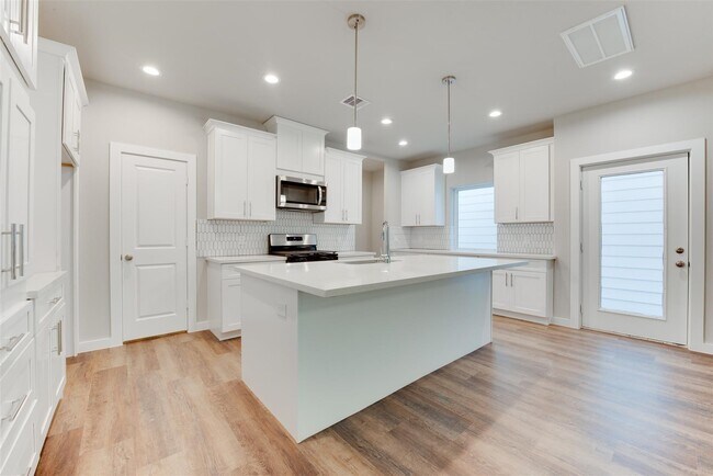 Building Photo - 6615 Ezzard Charles Ln