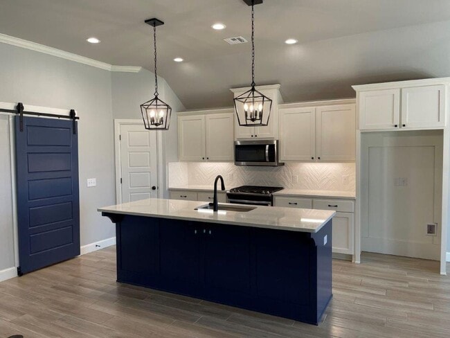 Building Photo - Deer Creek Schools! Storm Shelter, great colors, lots of light, swim, workout and play right in t...