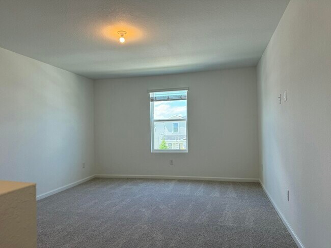 Building Photo - 10856 NW Everbreeze Dr