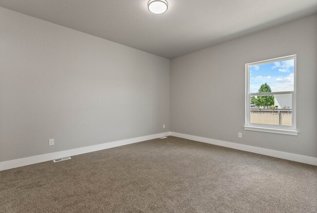 Building Photo - Newly Built 4 Bedroom Duplex With Yard