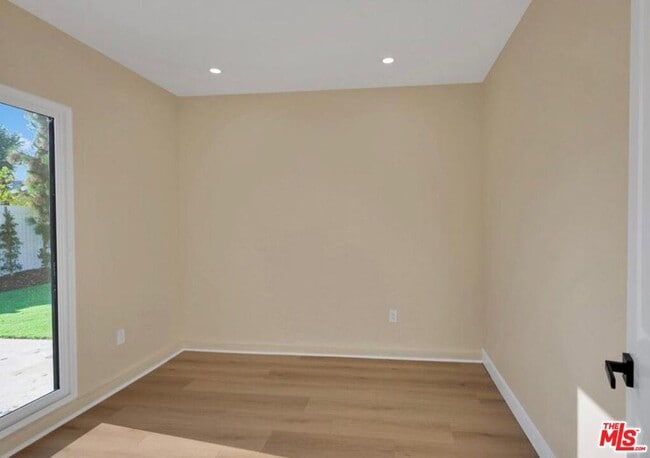 Building Photo - 10507 Dempsey Ave