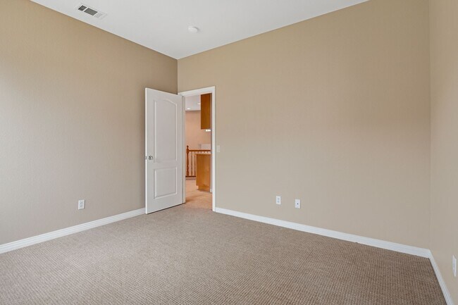 Building Photo - Gated corner lot home walking distance to the beach