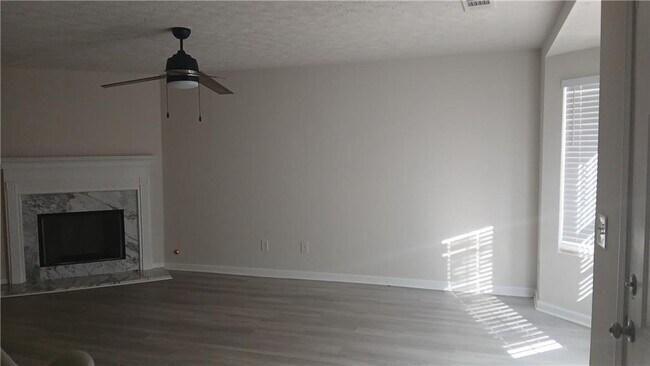 Building Photo - 5677 Wind Gate Ln