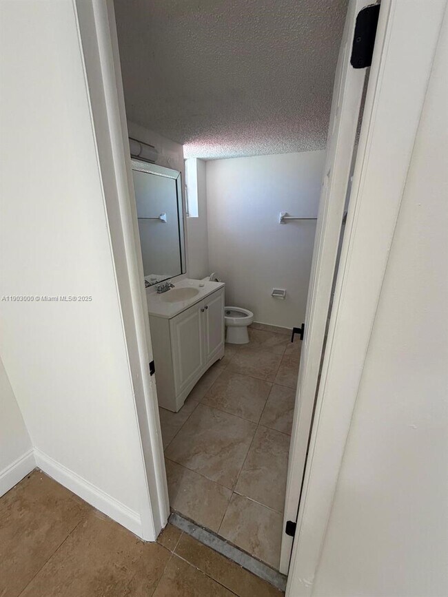 Building Photo - 10701 Royal Palm Blvd