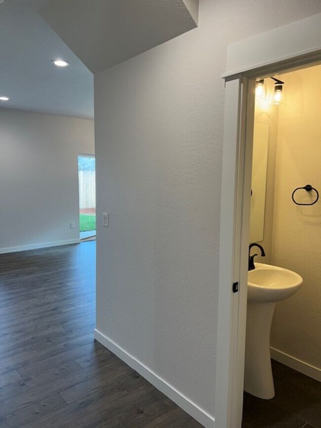 Building Photo - ALMOST NEW CONSTRUCTION/ 4 BEDROOM IN NEWER UPCOMING NEIGHBORHOOD