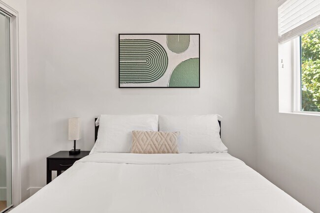 Building Photo - A 3 Bedroom apartment with ensuite bathrooms, common areas and a fully functional kitchen at 1736...