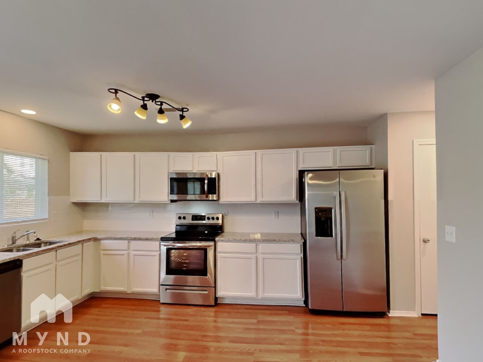 Building Photo - 6215 Woodland Commons Dr