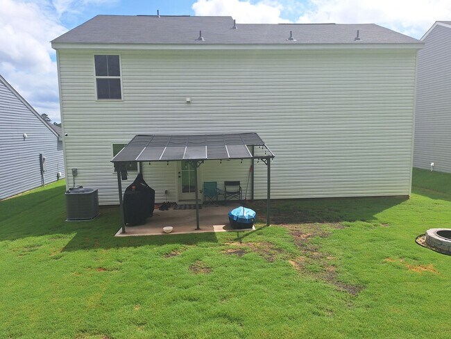 Building Photo - Outstanding Four Bedroom Home Less Than 10...