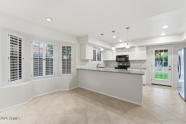 Building Photo - 5720 E Le Marche Ave