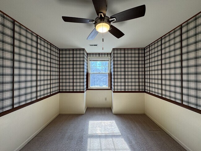 Building Photo - Introducing a charming Colonial style home...