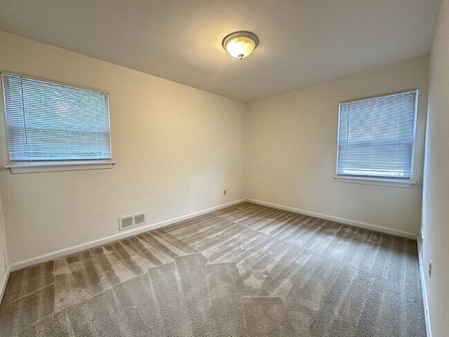 Building Photo - This classic brick rambler, located just around the corner from the West Falls Church Metro Stati...