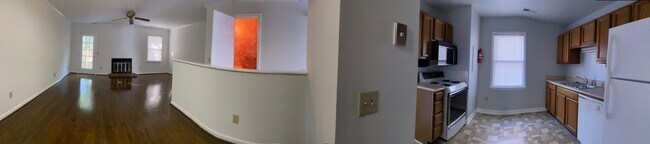 Panoramic view of Downstairs Restroom, Kitchen, and Living Room Area - 1901 Devonshire Dr