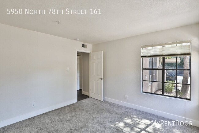 Building Photo - Stunning 3-Bedroom Condo -MOVE IN SPECIAL!...