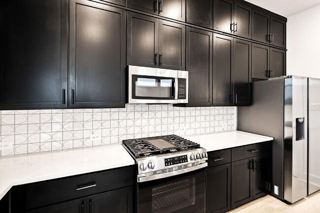 Building Photo - Brand-New, Never-Lived-In Townhome – A San...