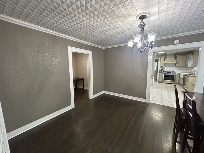Building Photo - Spacious Corner Lot Charm