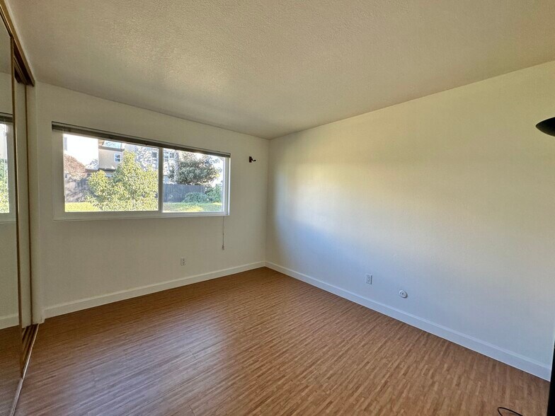 2nd bedroom has an extra wide closet with mirror sliding doors - 9505 Easter Way