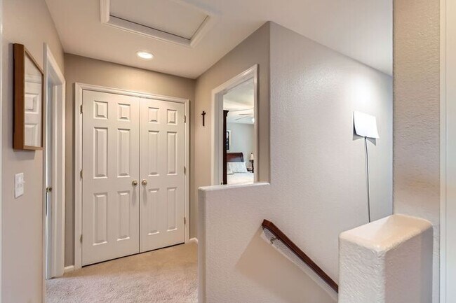 Building Photo - Updated 4-Bedroom with Serene Outdoor Spac...