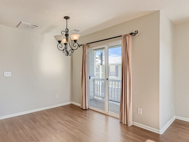 Building Photo - Evolve Real Estate: Spacious 2 Bed 2 Bath Condo with Attached Garage in Parker!
