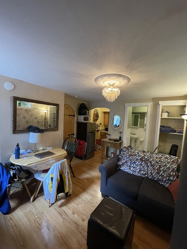 See the kitchen in the background, center, bath to the right, and cleaning/linen closet (farbupright - 8310 Stone Ave N