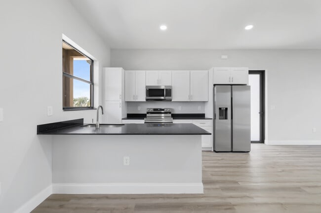 Building Photo - 8014 Mangrove Cir