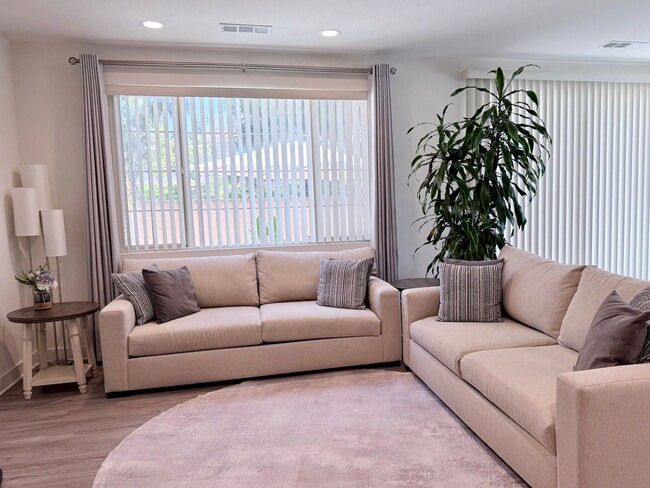 Building Photo - Stunning 3-Bed/2.5-Bath End Unit Condo with Solar & Large Yard