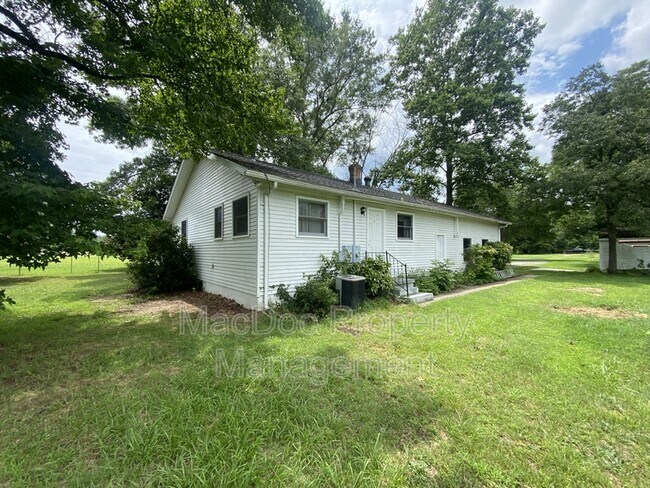 Building Photo - 10291 Paige Rd