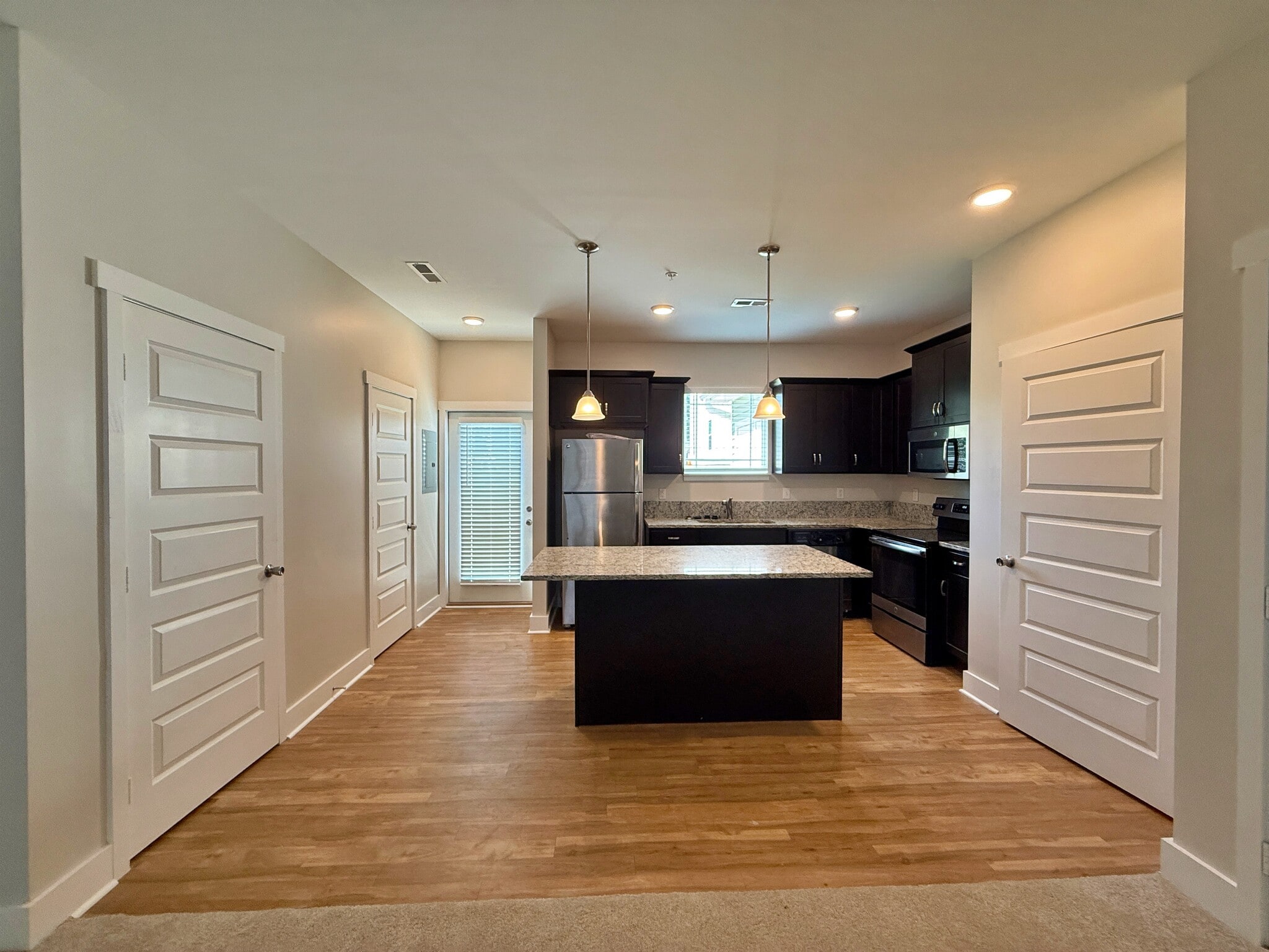 The spacious kitchen offers plenty of prep space and storage. - 3010 Bellflower Cir