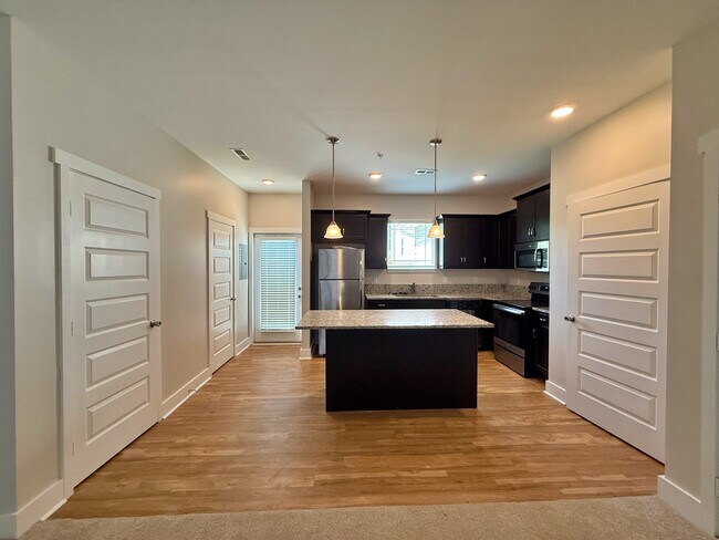 The spacious kitchen offers plenty of prep space and storage. - 3010 Bellflower Cir