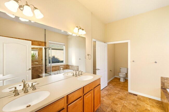 Building Photo - Beacon Point 5 Bedroom Ranch, 3-Car Garage...