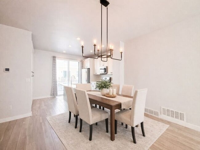 Building Photo - Stunning and Spacious 3BR 3BA Townhouse w/ Quartz Kitchen + Garage Parking + Modern Finishes in E...
