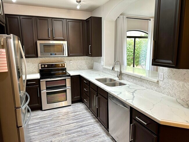 Building Photo - Gorgeous remodel update! No neighbors behind hillside lot