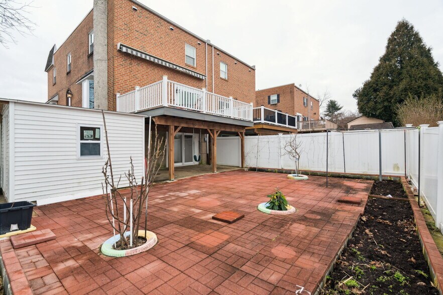 Backyard with Pavers, Fruit Trees and Garden Space - 100 Rennard Ter