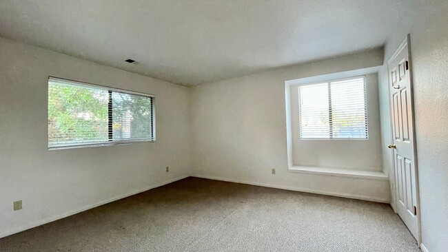 Building Photo - 2 Bedroom Condo with 2-Car Garage in Parkside Condominiums by Meadow Park