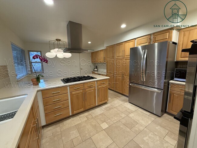 Building Photo - Beautifully Updated Three Bed (+ Bonus) Quail Lodge Home