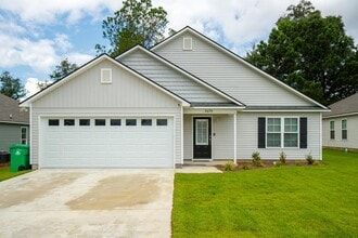 Building Photo - Contemporary 4BR/2BA Home with 2-Car Garage, Spacious Yard, and Close Proximity to Moody Air Forc...