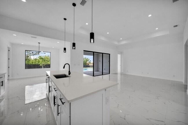 Building Photo - Brand-New Pool Home for Rent – Port Charlo...
